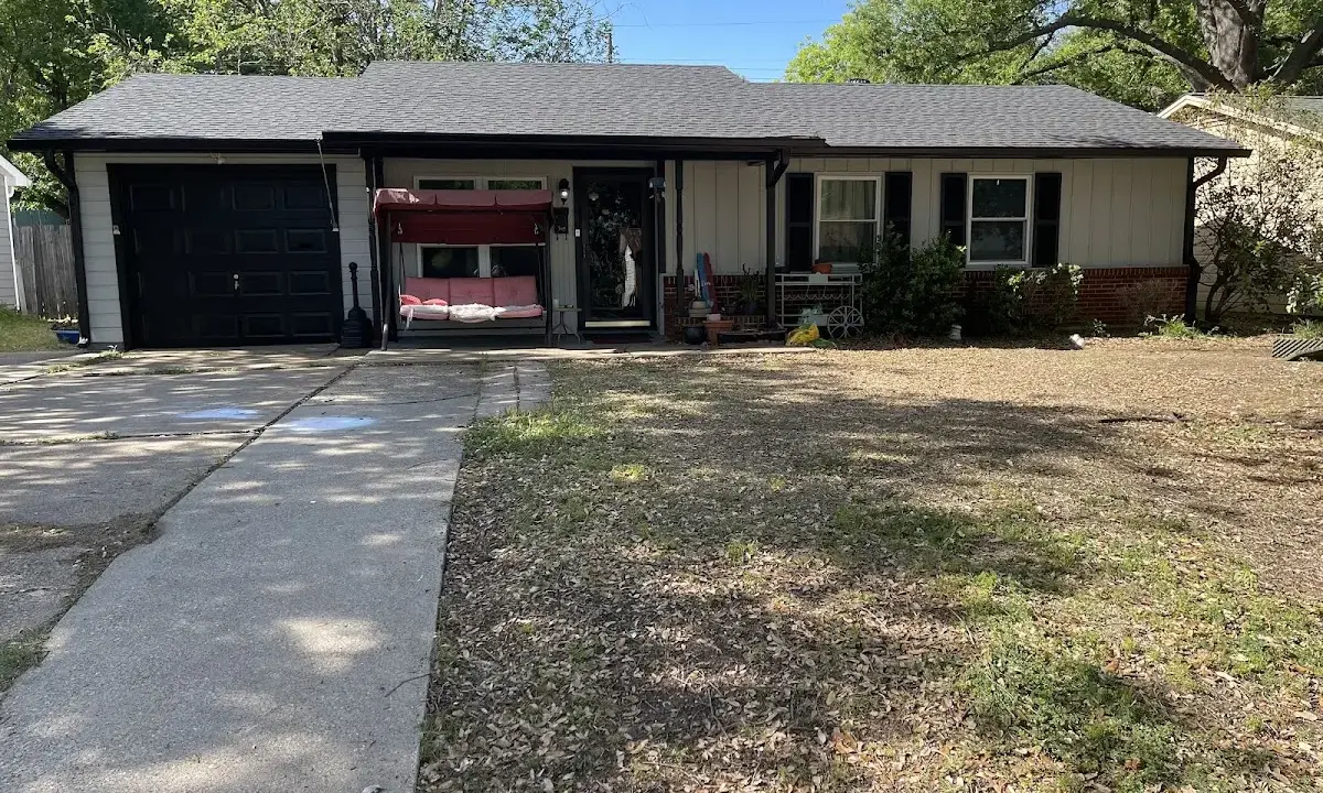 Asphalt Shingle Roof Repair crew at work on a residential roof in Samsula-Spruce Creek